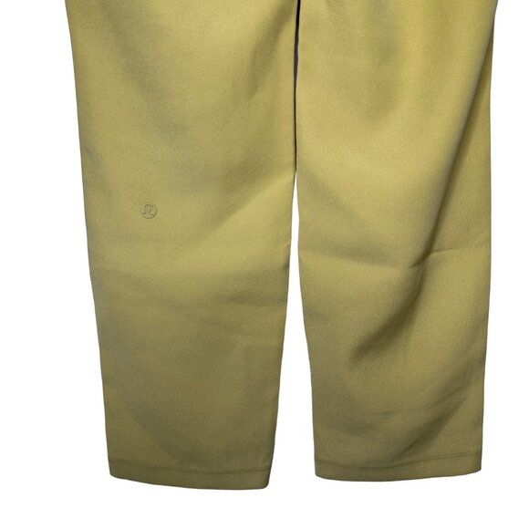 Lululemon On the Fly 7/8 Pant Size 4 Vintage Gold Mustard Yellow Woven - Picture 8 of 10